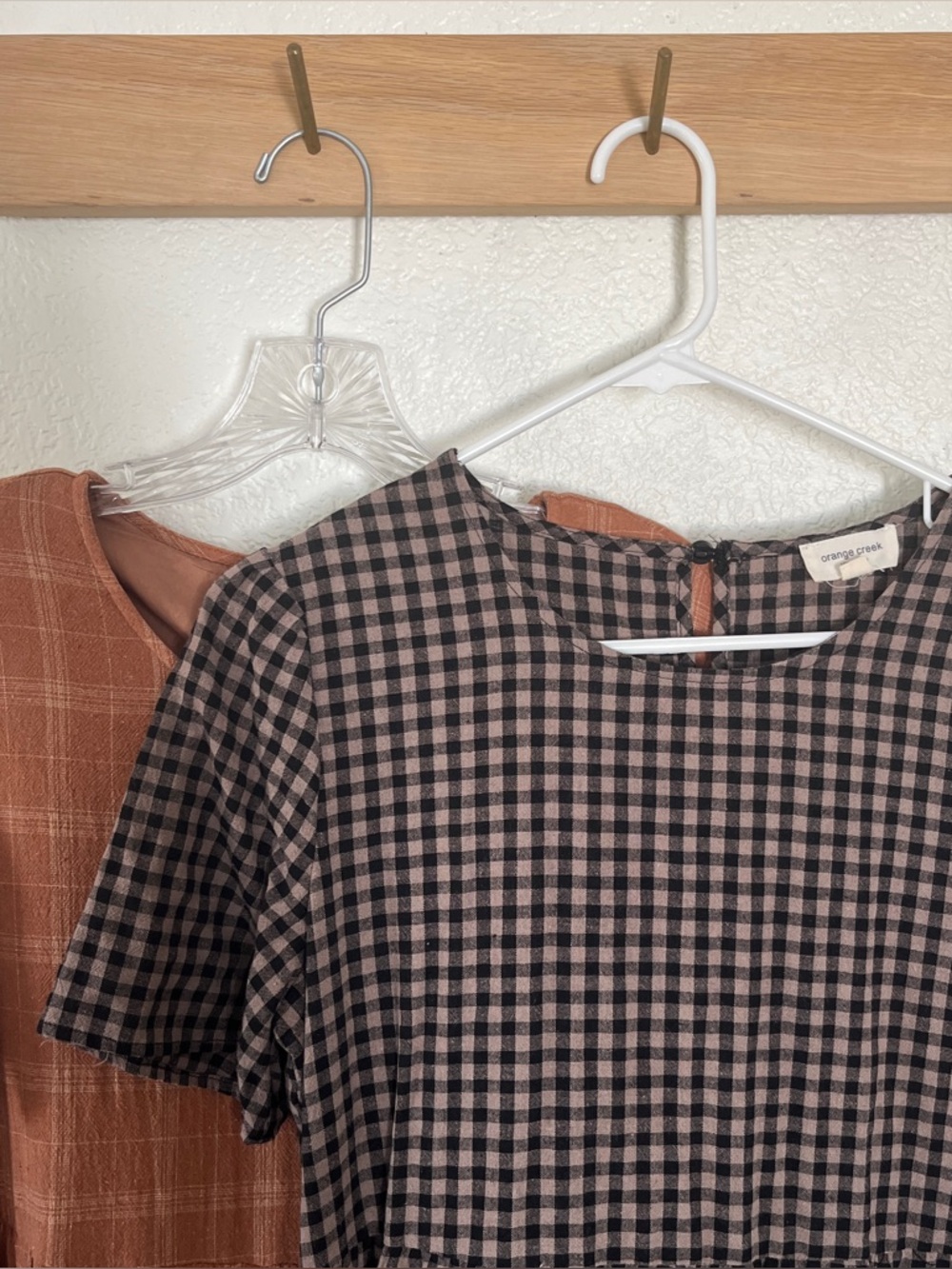 Pair of PinkBlush maternity dresses, orange plaid and black gingham